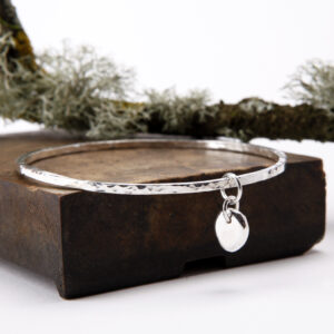 Molten silver charm hammered bangle – square